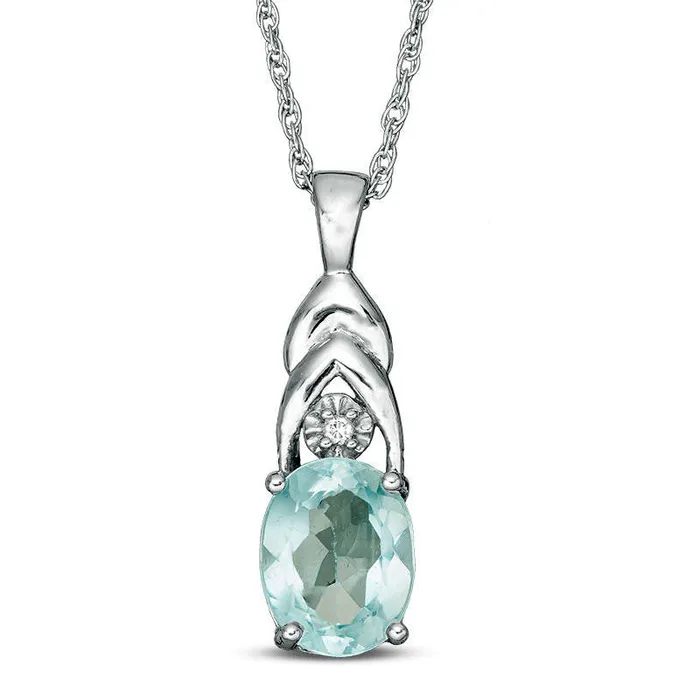 Necklaces Goldia Oval Blue Topaz and Natural Diamond Accent Layered Pendant in Sterling Silver Necklaces Goldia Oval Blue Topaz and Natural Diamond Accent Layered Pendant in Sterling Silver